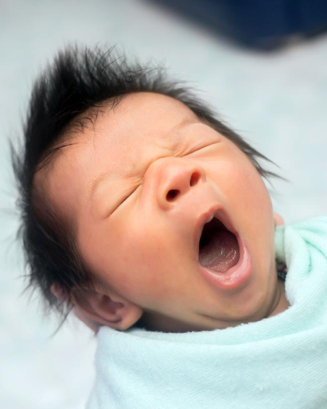 Newborn yawning